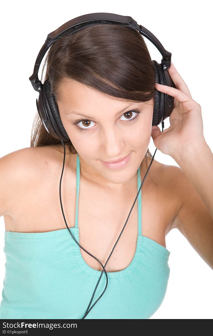 Pretty teen with headphones. over white background. Pretty teen with headphones. over white background