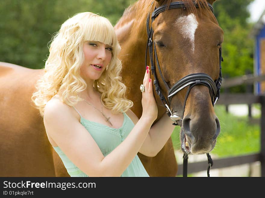 Young woman with horse