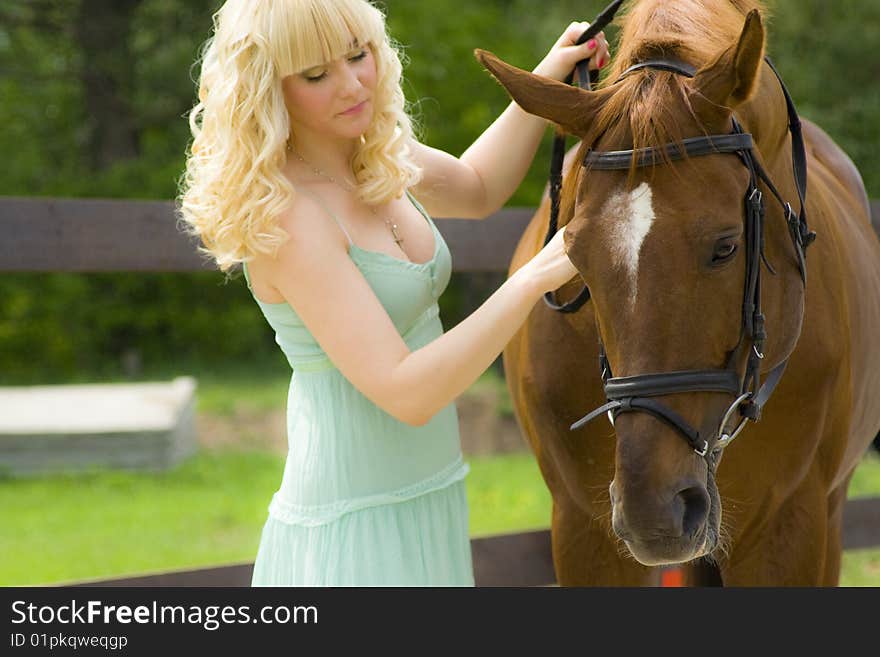 Young woman with horse