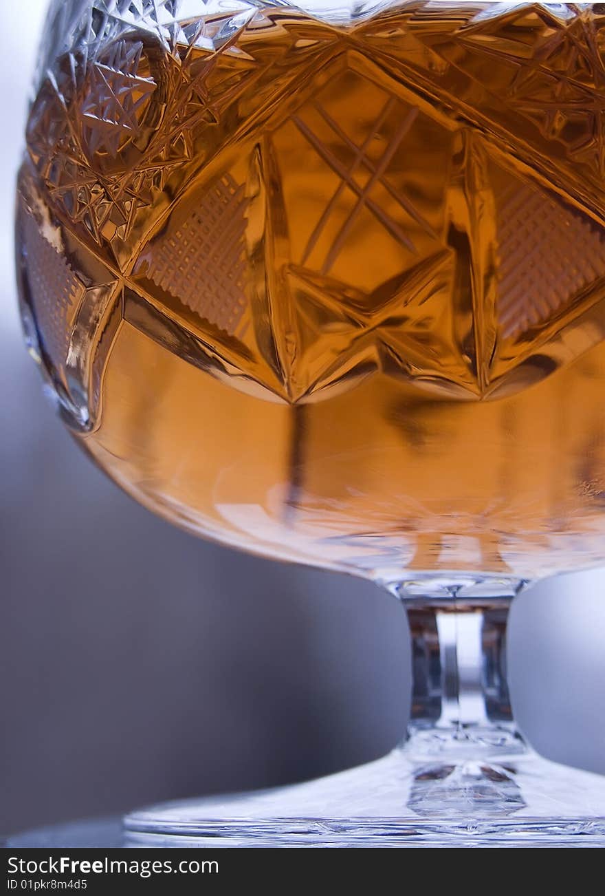 Snifter glass of cognacs( close-up).