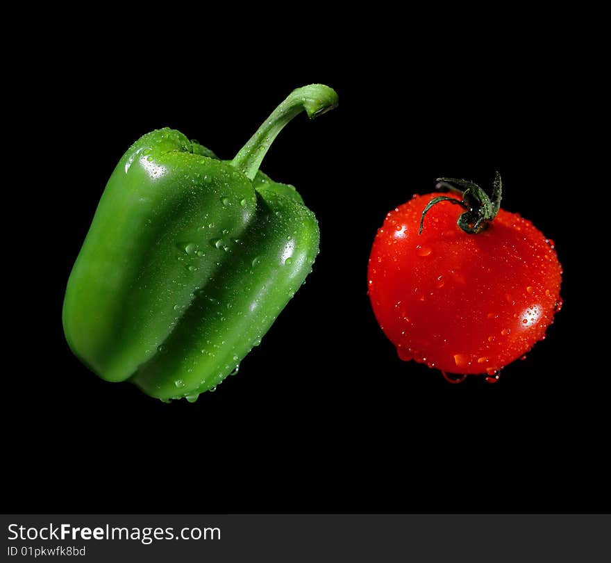 Green pepper and red tomato