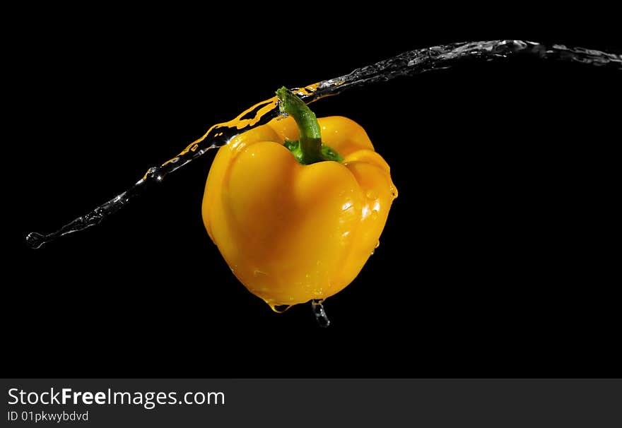 Yellow pepper in water stream