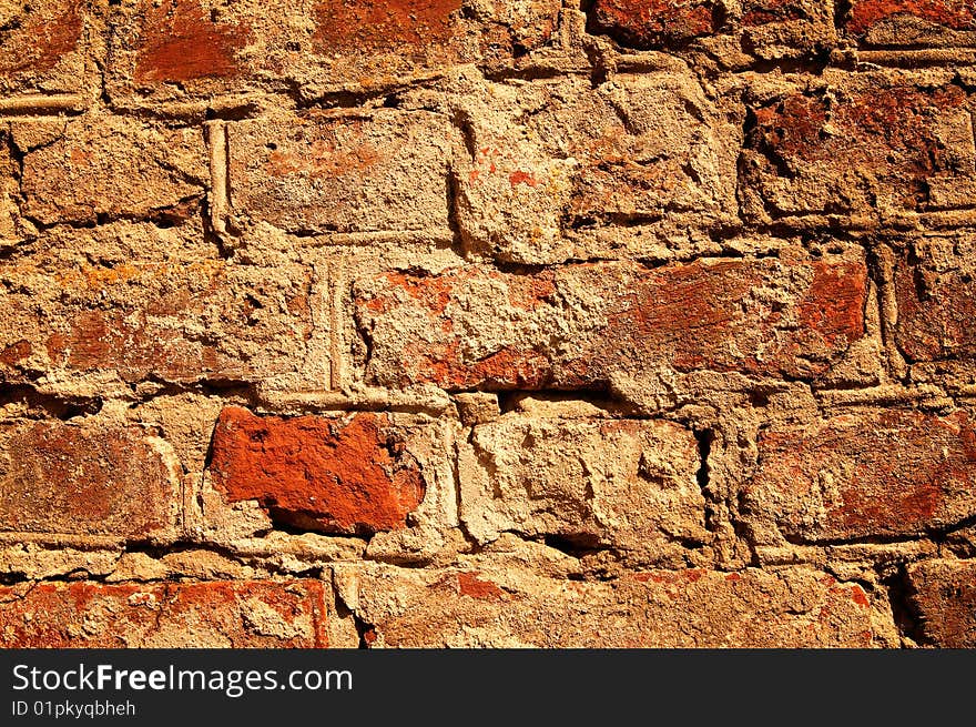 Cracked old brick wall like as antique background. Cracked old brick wall like as antique background.