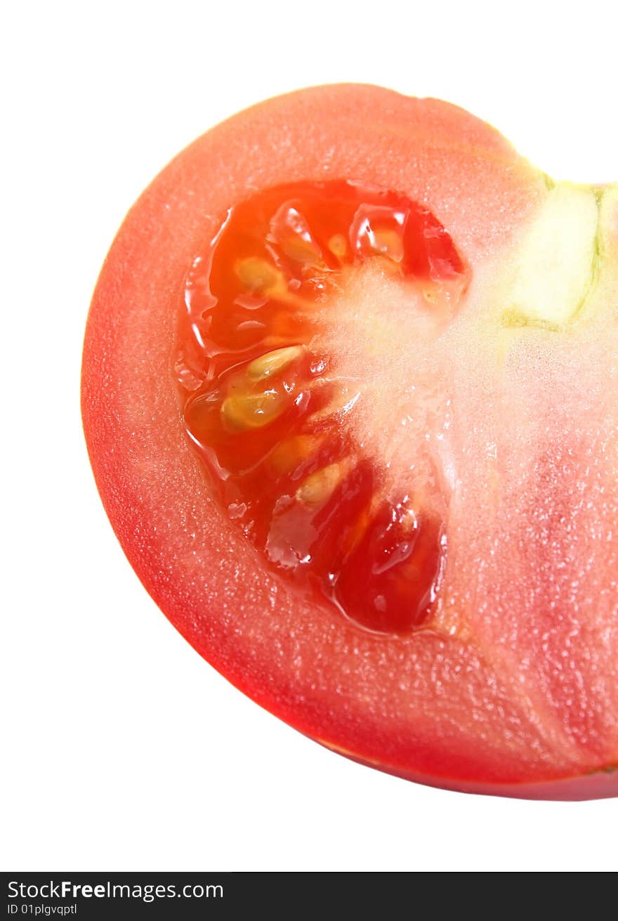 Tomato cut close-up isolated on white beckground. Tomato cut close-up isolated on white beckground