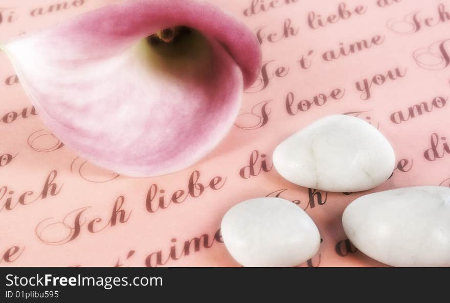 Love letter with calla flower and three  little stones