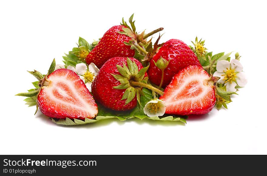 Strawberry slice and blossom isolated on white background