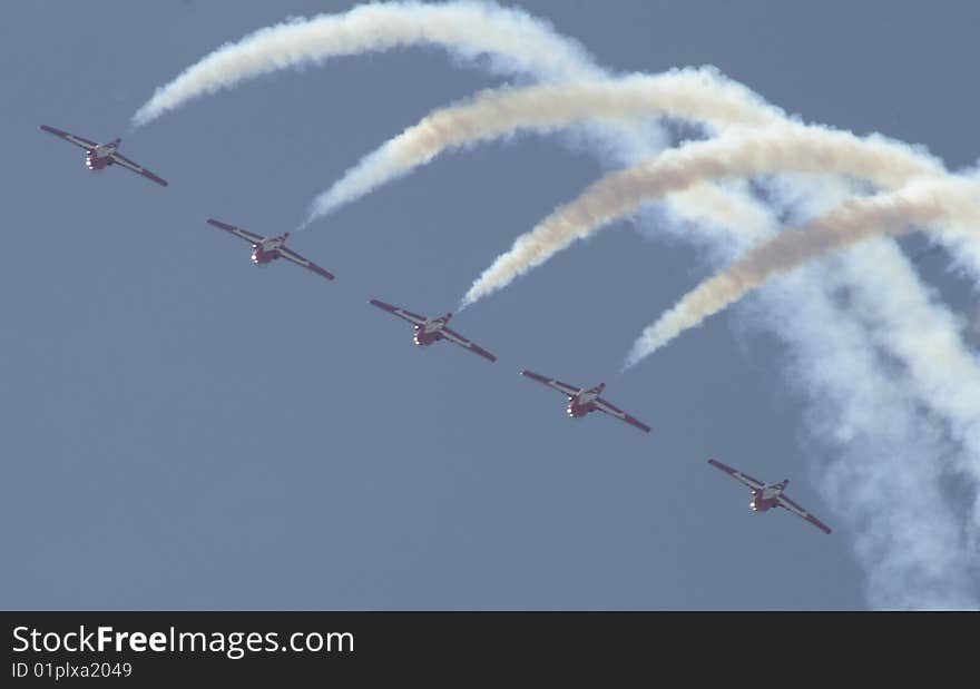 Aerial acrobatic team in formation with smoke. Aerial acrobatic team in formation with smoke