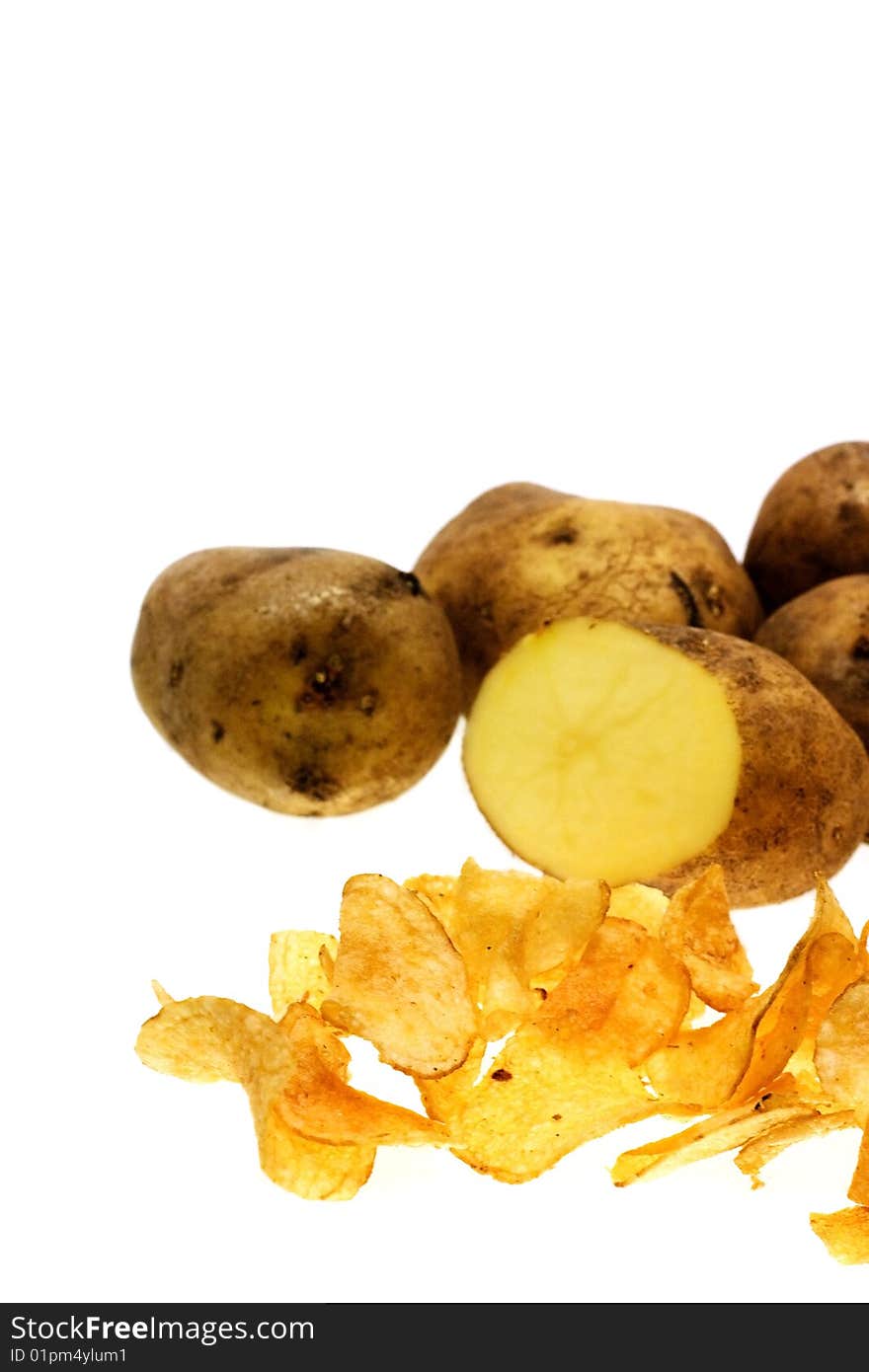 Tubers raw potatoes on a white background. Tubers raw potatoes on a white background