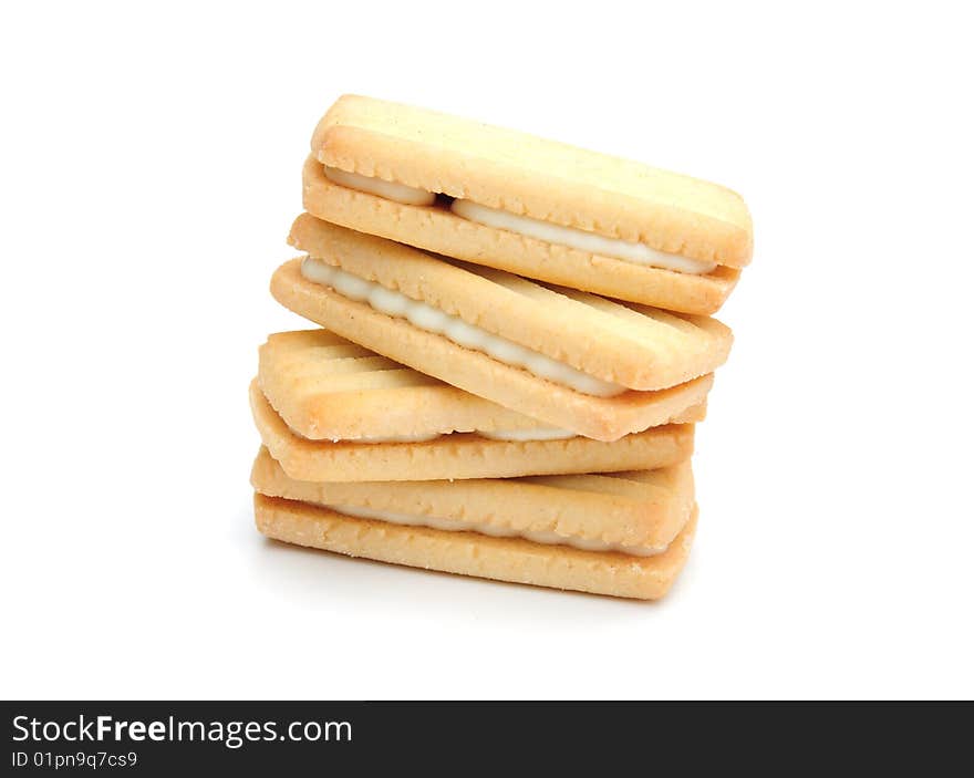 Shot of a pile of cream biscuits