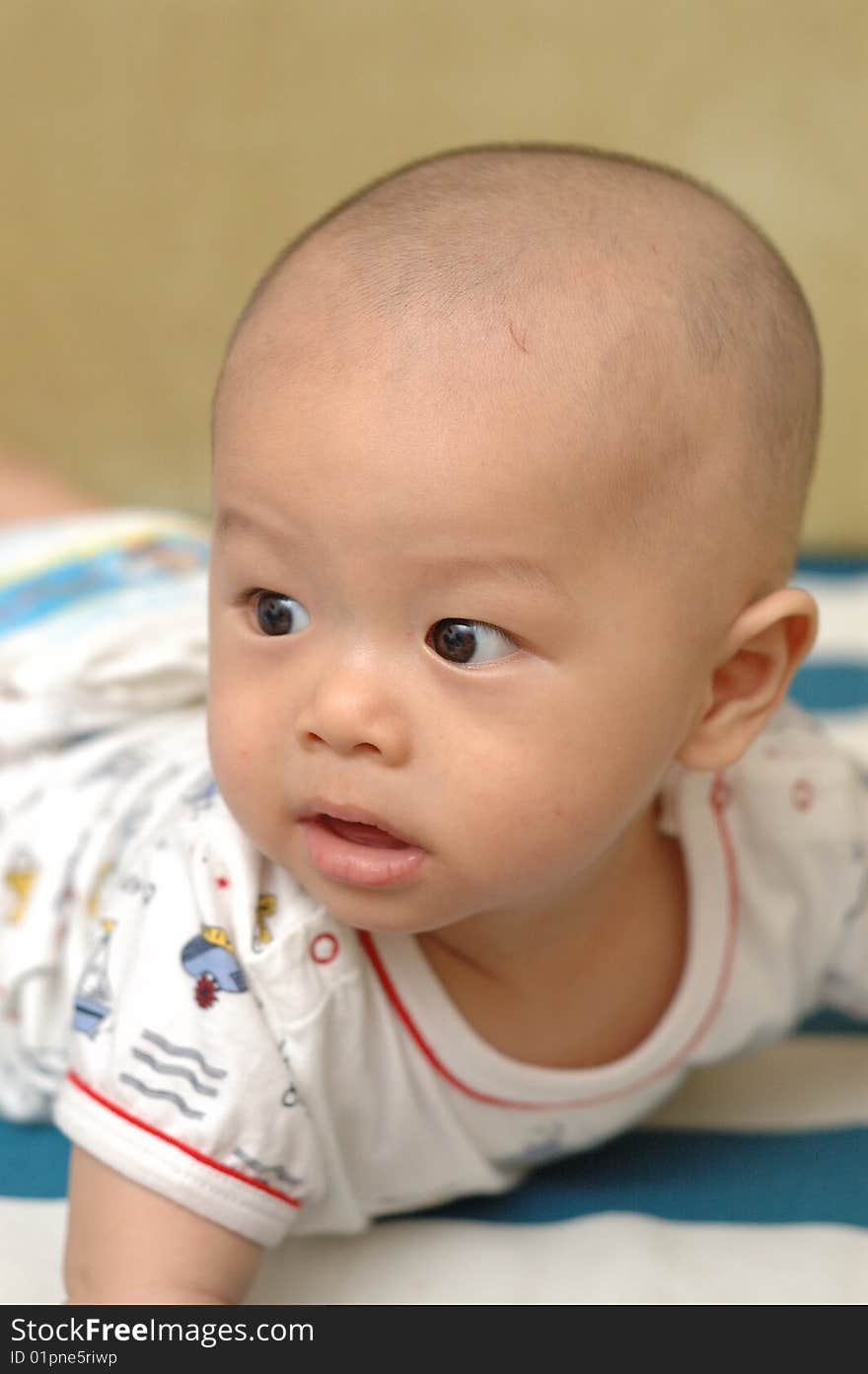 It is a cute chinese baby, isolated. he is 6 months. It is a cute chinese baby, isolated. he is 6 months.