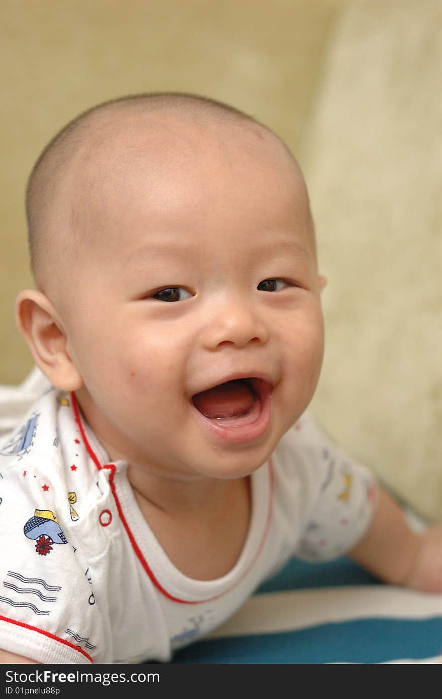 It is a cute chinese baby, isolated. he is 5 months. It is a cute chinese baby, isolated. he is 5 months.