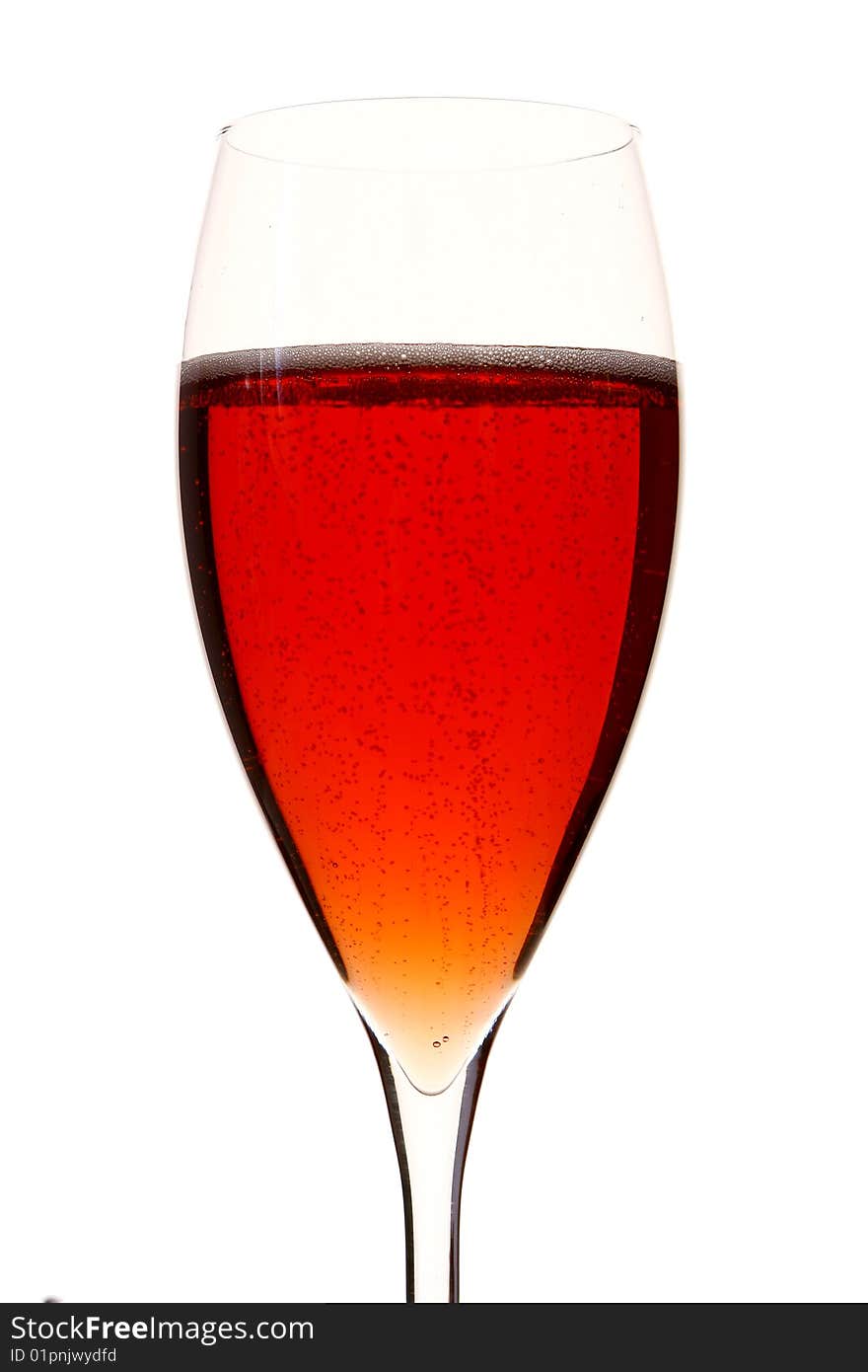 A red champagle glass with alcohol