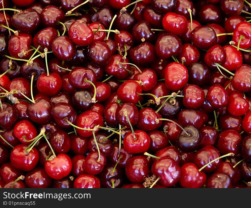 Pile of red cherries at the market