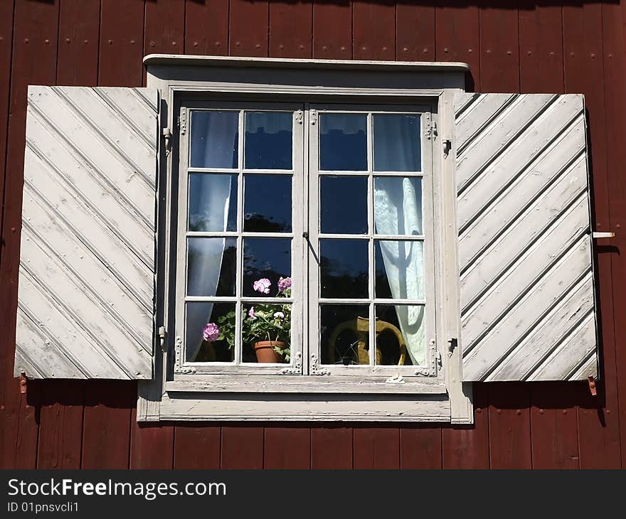 A window of an old wooden museum house