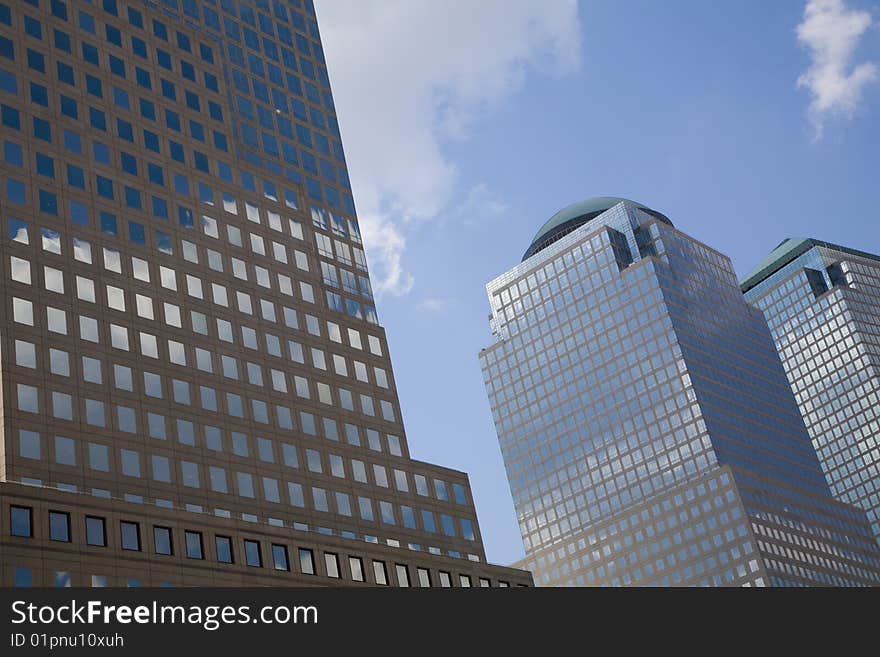 Urban view at modern glass building with reflection on blue sky. Urban view at modern glass building with reflection on blue sky