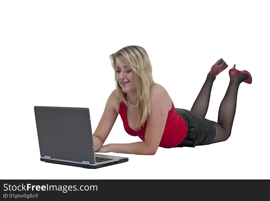 Young sexy woman typing on laptop