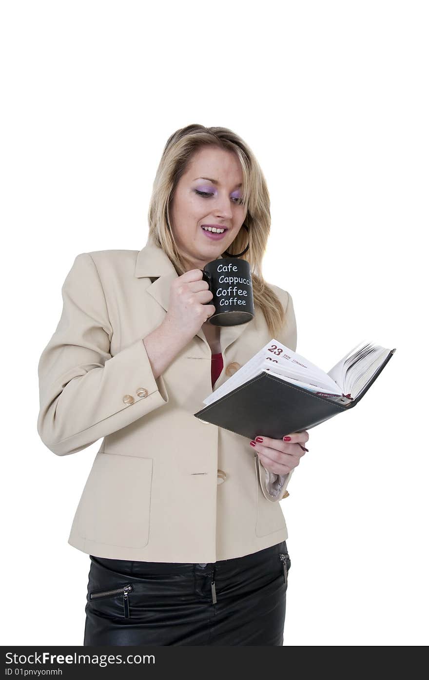 Young girl in office reading her notes. Young girl in office reading her notes