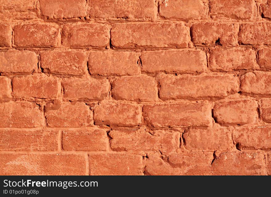 The fragment of the wall of brick.