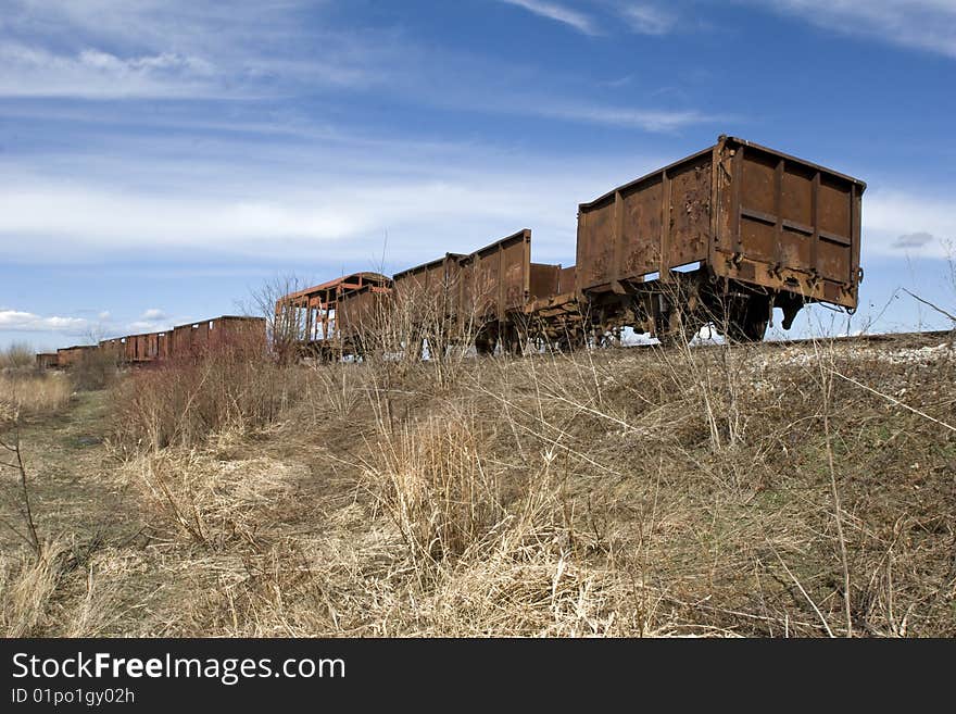 Old abandoned rusting train and railway. Old abandoned rusting train and railway