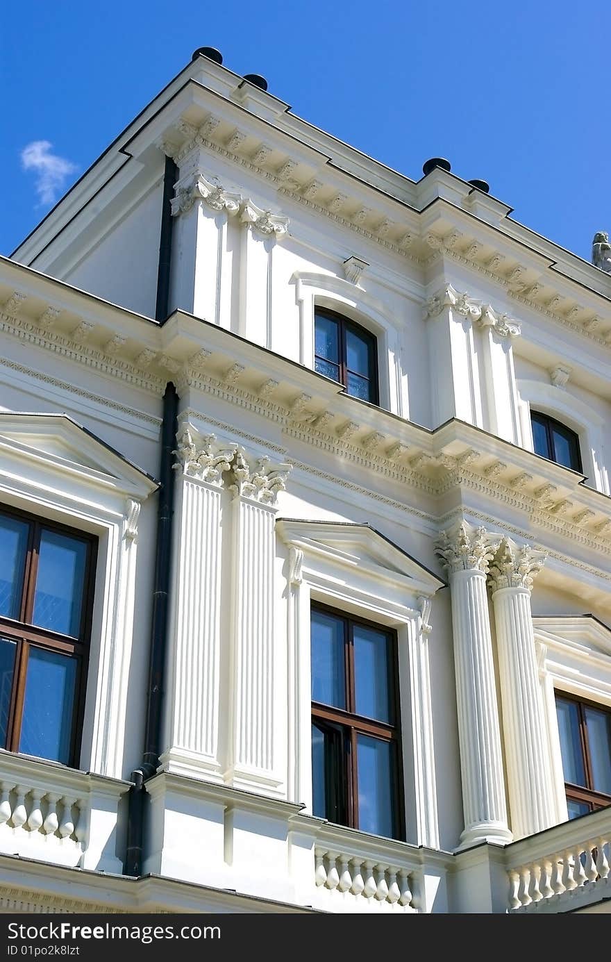 White building on blue sky background