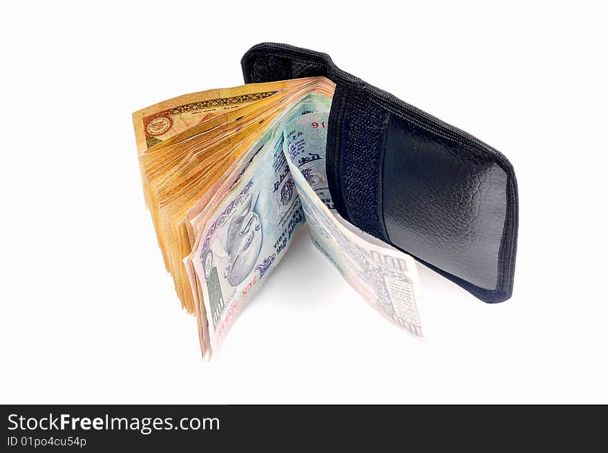 Money in pouch isolated in white background.