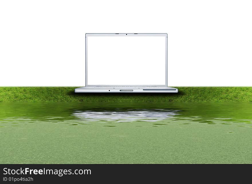 Blank laptop computer on the green grass isolated on a white