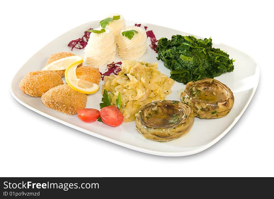 Assorted vegetables: Potato croquettes, mashed potatoes, spinach, sauerkraut, artichoke hearts and cherry tomatoes