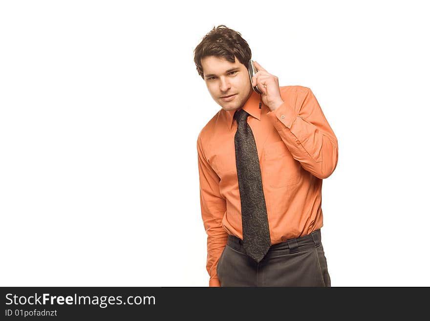 Young, good looking businessman standing in front of a white background. Young, good looking businessman standing in front of a white background