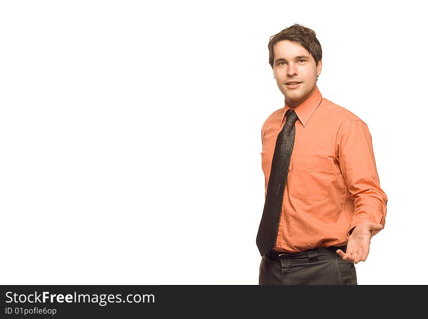 Young, good looking businessman standing in front of a white background. Young, good looking businessman standing in front of a white background