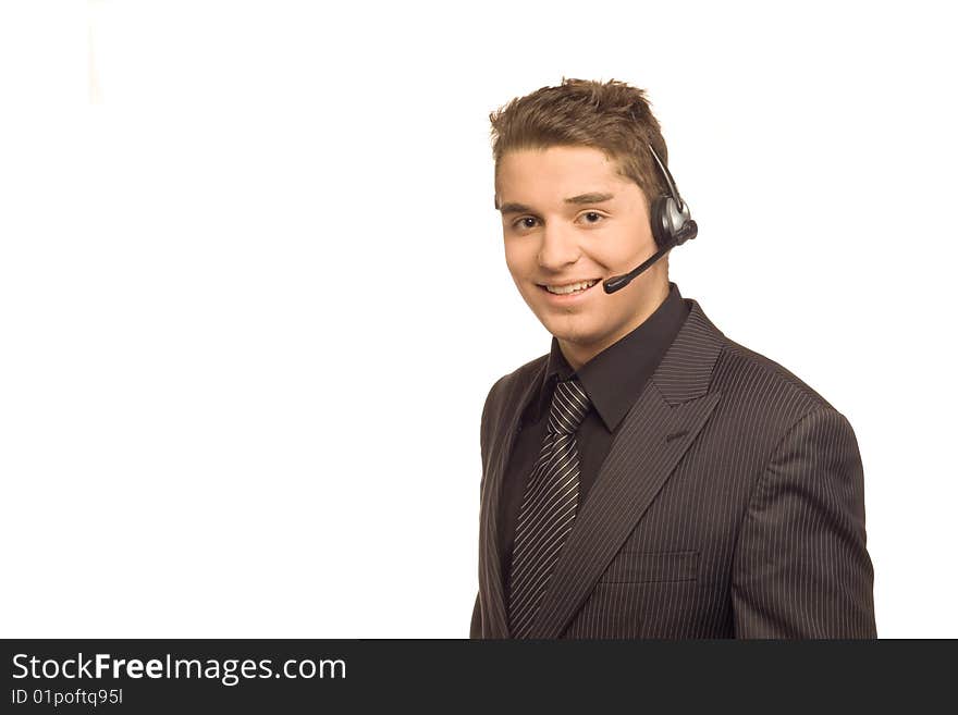 Young, good looking businessman standing in front of a white background. Young, good looking businessman standing in front of a white background