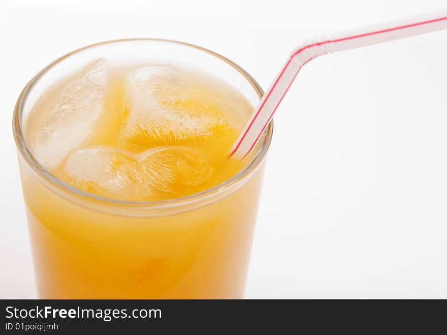 Glass of juice isolated over white background