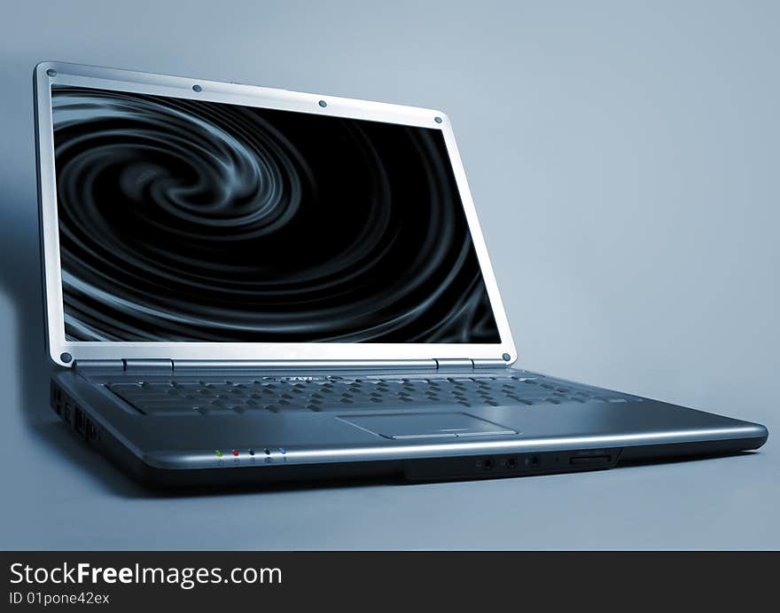 Futuristic laptop computer on dark background