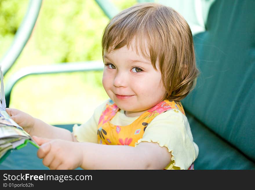 Toddler baby girl in garden. Toddler baby girl in garden