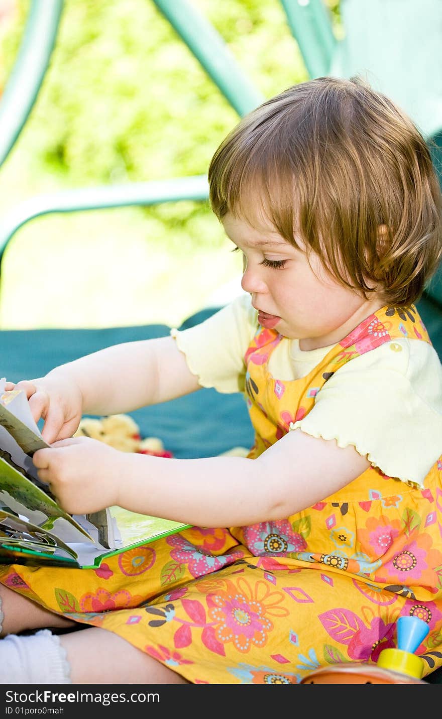 Toddler baby girl in garden. Toddler baby girl in garden