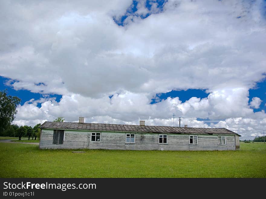 Beautiful cloudscape in the park. old house ruins.