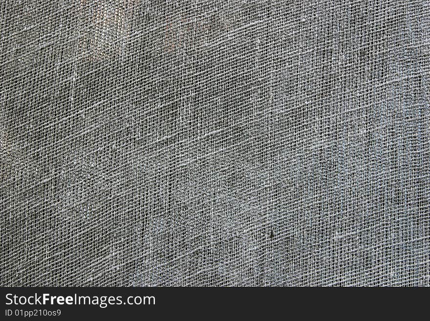 Dirty grey surface of coarse texture as a background. Dirty grey surface of coarse texture as a background