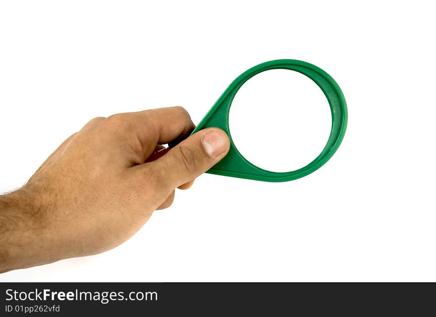 Hand with magnifying green glass. Hand with magnifying green glass