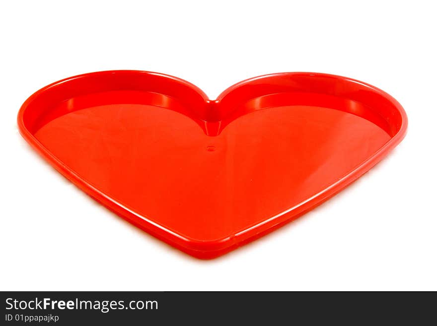 Red heart tray isolated on a white background