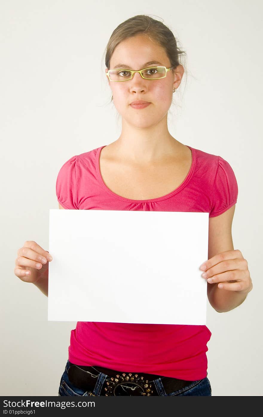 Young female is holding a paper to write on