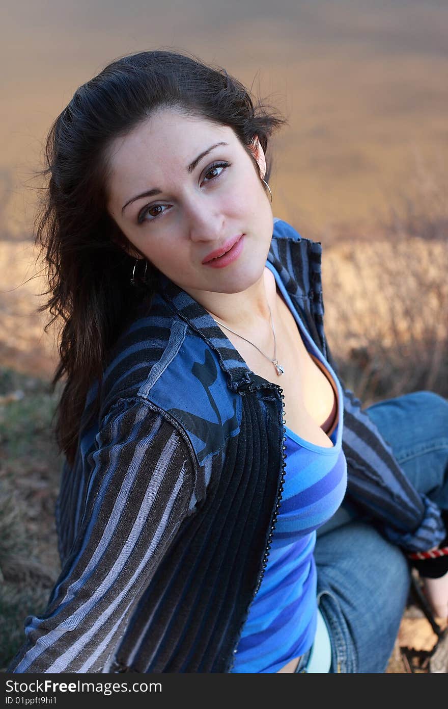 A woman s portrait near the water