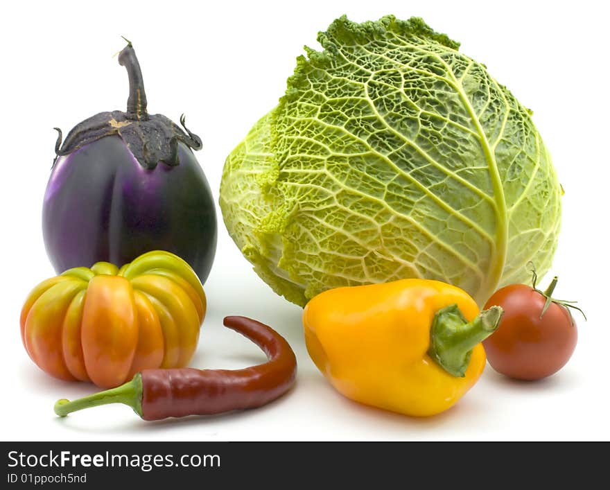 Vegetables Isolated on a white background Egplant, Cabbage, Pepper and Tomatoes