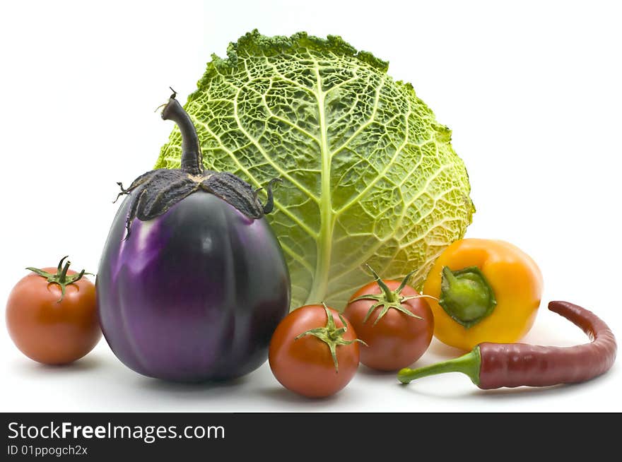 Cabbage, pepper, eggplant and tomatoes isolated on white background. Cabbage, pepper, eggplant and tomatoes isolated on white background