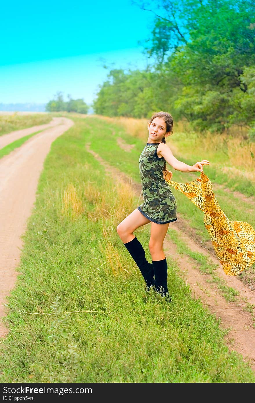 Portrait girl on nature on road