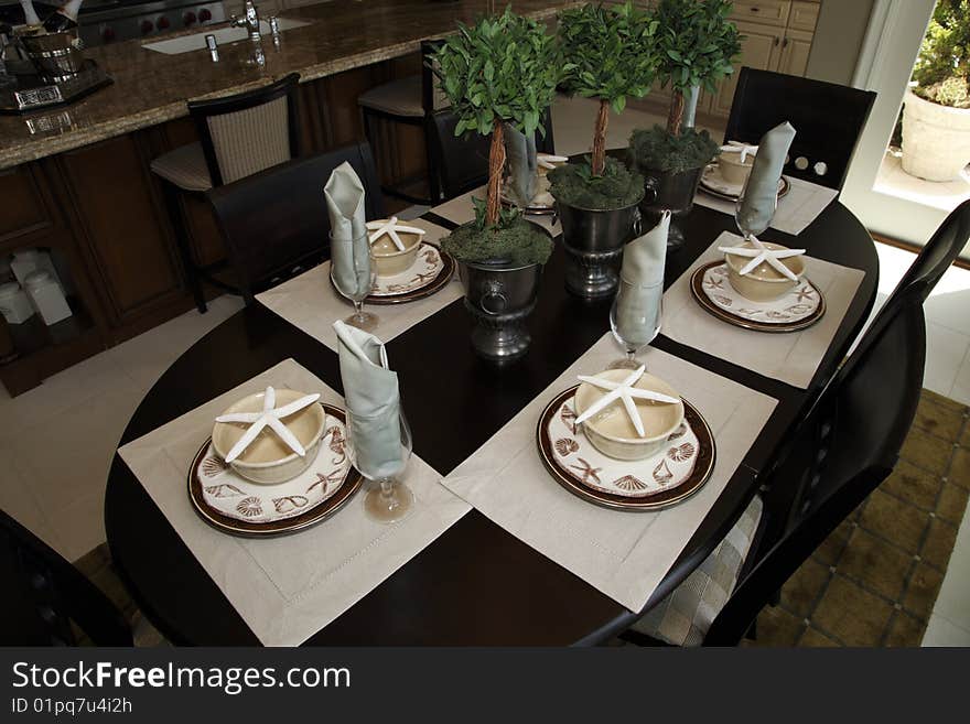 Dining table with luxurious tableware and decor. Dining table with luxurious tableware and decor.