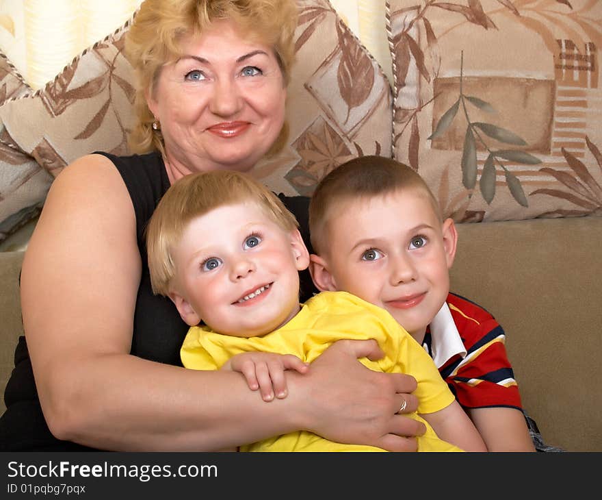 Portrait Of The Grandmother With The Grandsons