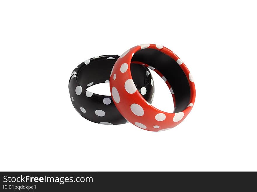 Two female, leather bracelets, red and black, located on the isolated white background