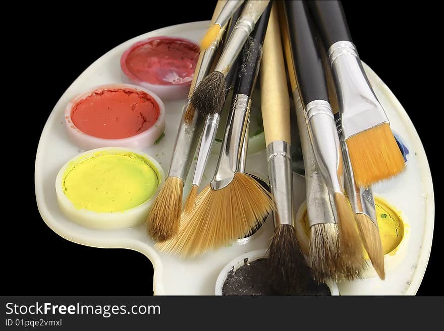 Set of art brushes and water colour