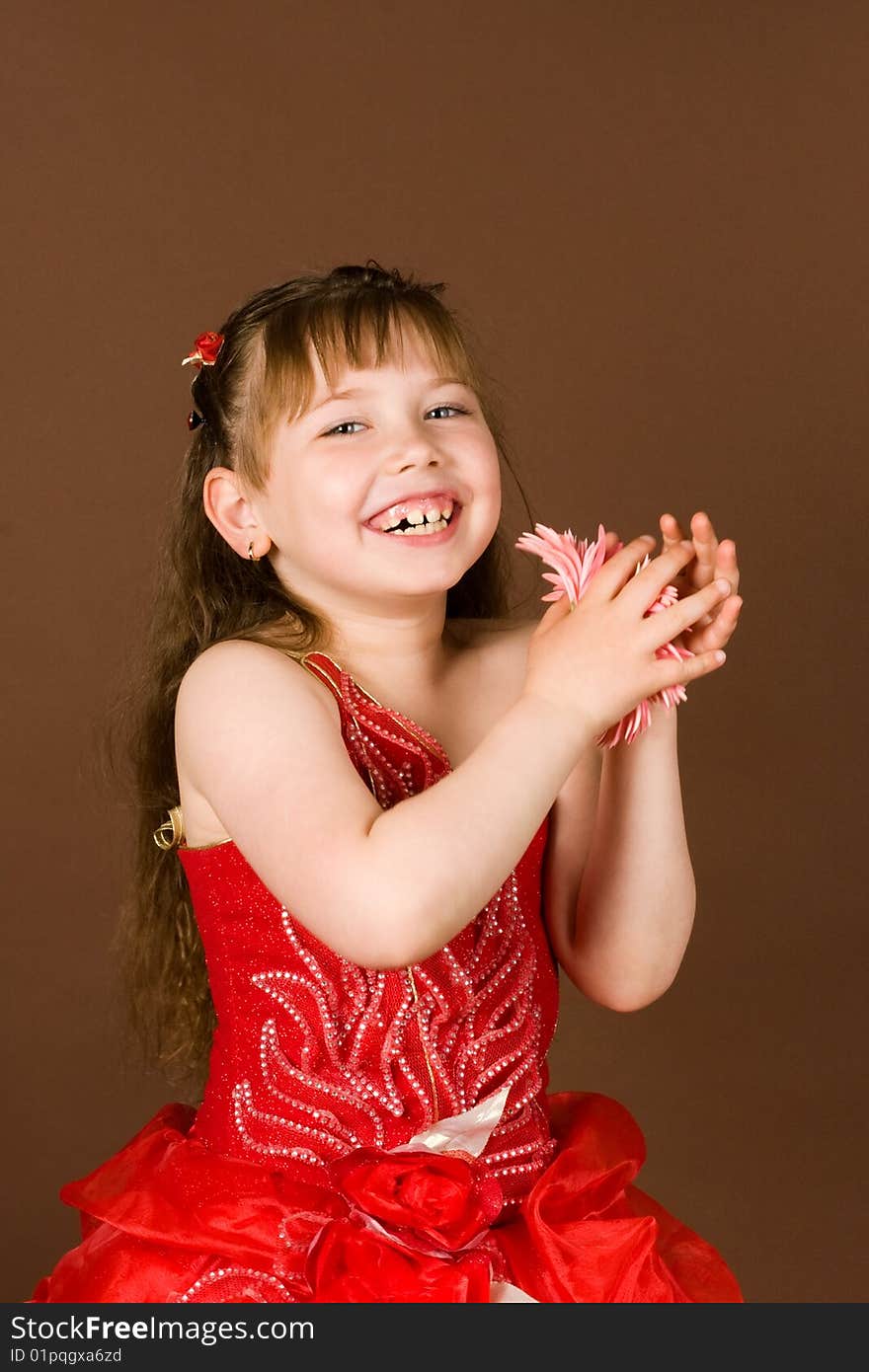 An image of a beautiful girl with a flower. An image of a beautiful girl with a flower