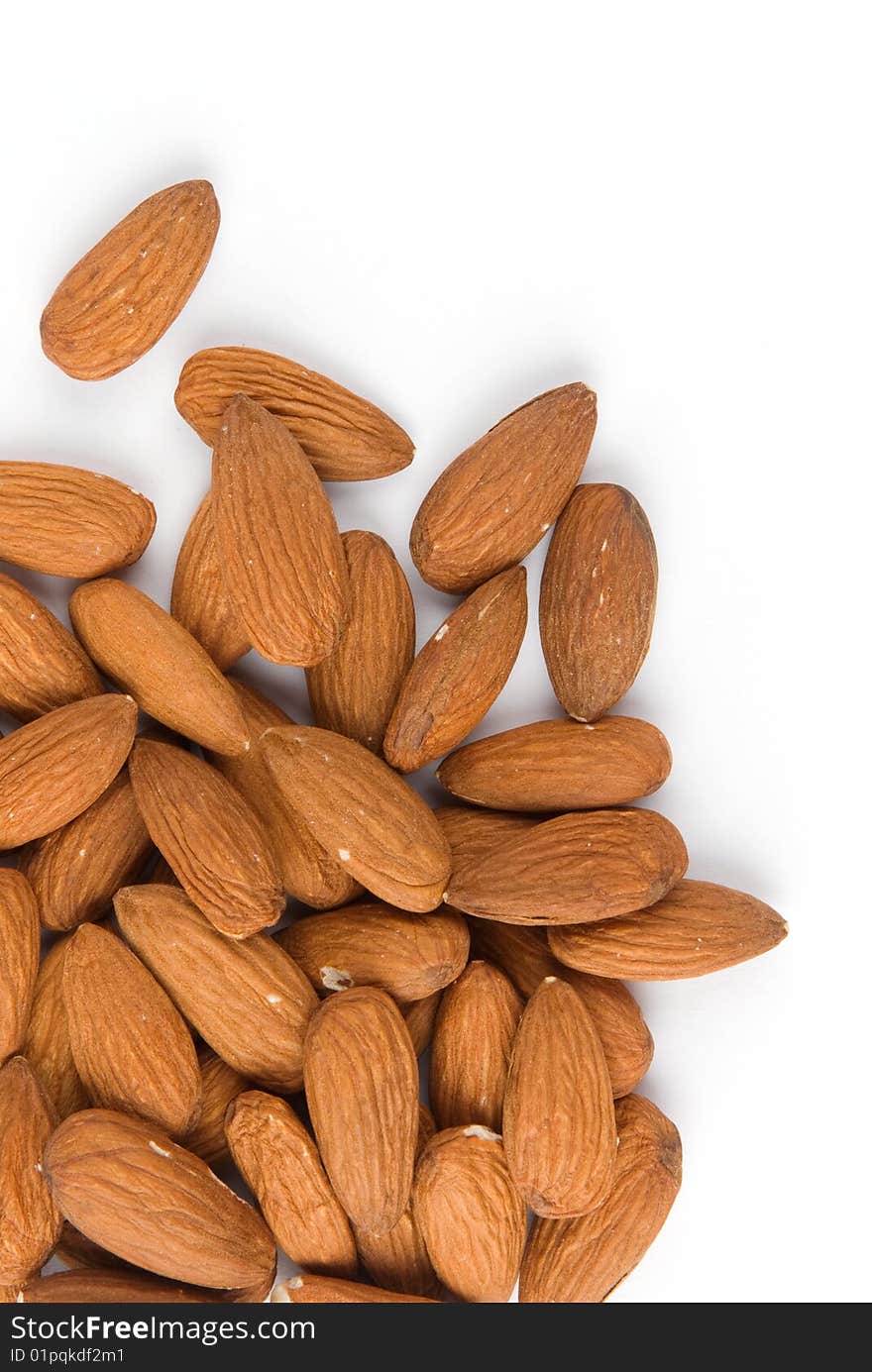 Pile of almonds on white background