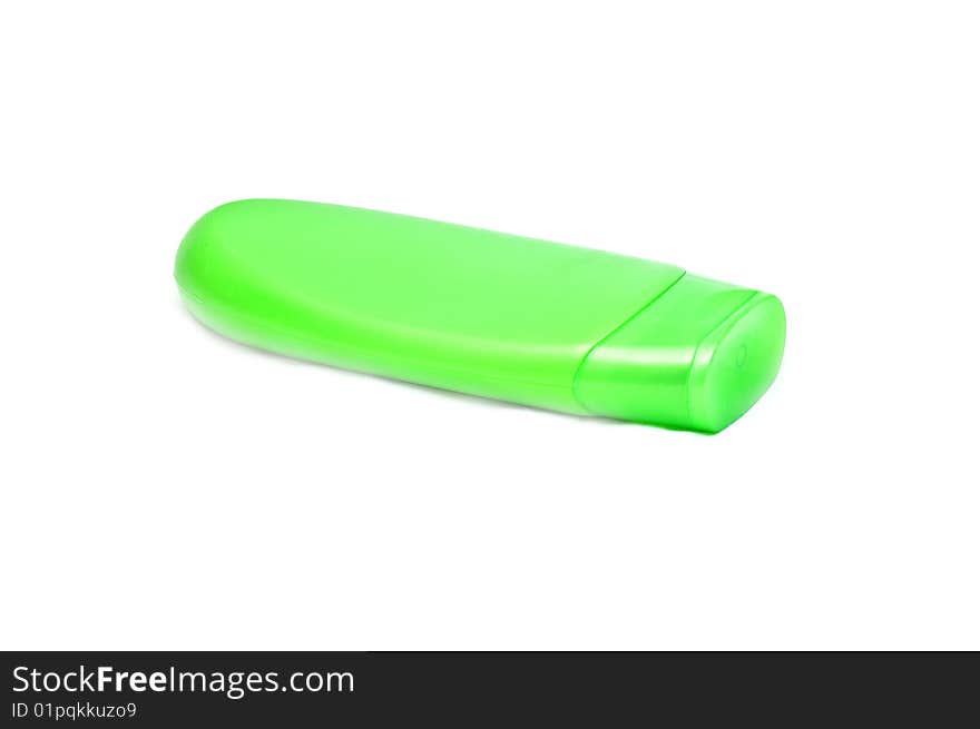 Photo of green shampoo bottle